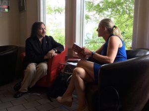 Federal Environment Minister Catherine McKenna and David Berman sitting in chairs talking about Do Good Design book